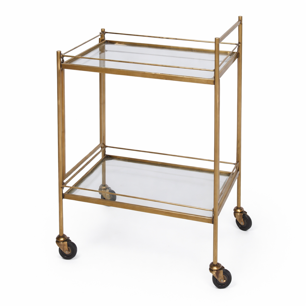Designer Hamilton glass service cart by Uvais Saifi with sleek glass surfaces and modern metal frame, ideal for stylish serving and display.
