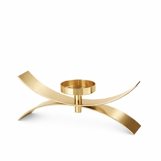 Brich & Bronze Xerra Arc Gold candle holder with sleek, curved design and a polished gold finish on a neutral background.