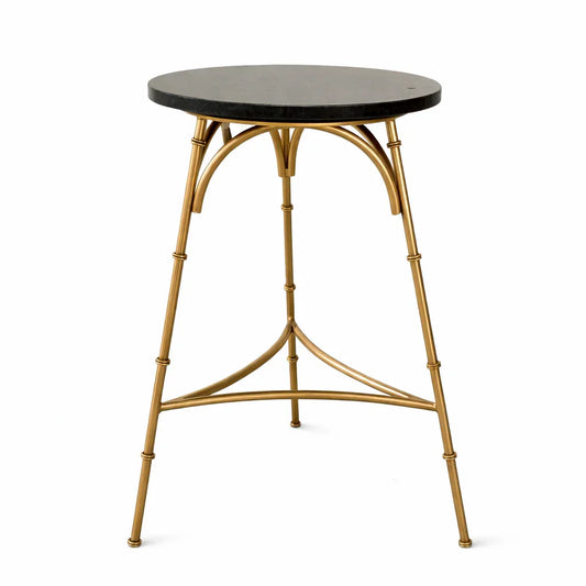 Round black stone top side table with gold metal legs, luxury furniture piece