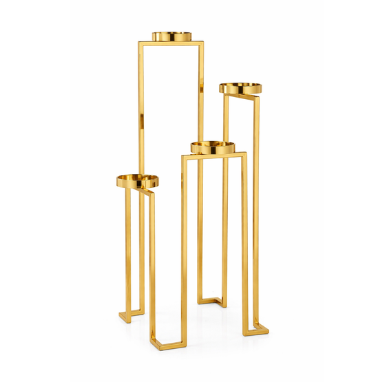 Gold floor candle stand by Brich & Bronze with elegant design and tall, slender structure suitable for holding pillar candles.