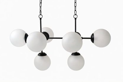 Kehf Al Fateh Orion 8-light linear globe chandelier with modern designer style and sleek metallic finish, hanging with spherical glass globes.