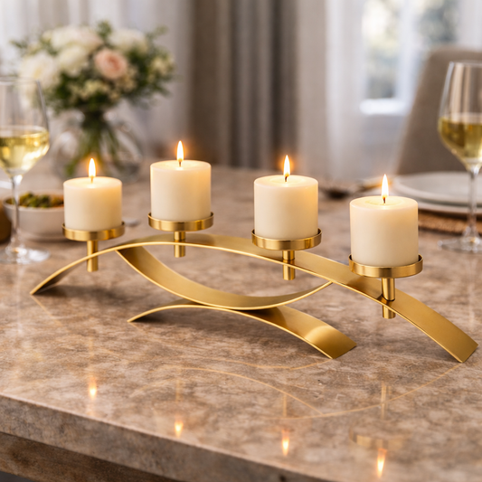 Brich & Bronze Linea Curve four-candle centerpiece with sleek, modern design and elongated curved holder on a table.