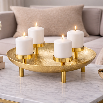 Gold candle centerpiece with ornate crest design from Brich & Bronze, featuring multiple candle holders and decorative accents.