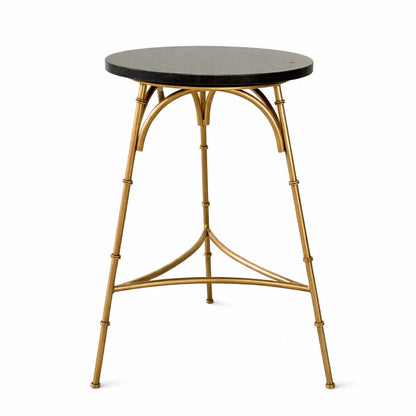 Round black stone top side table with gold metal legs, luxury furniture piece
